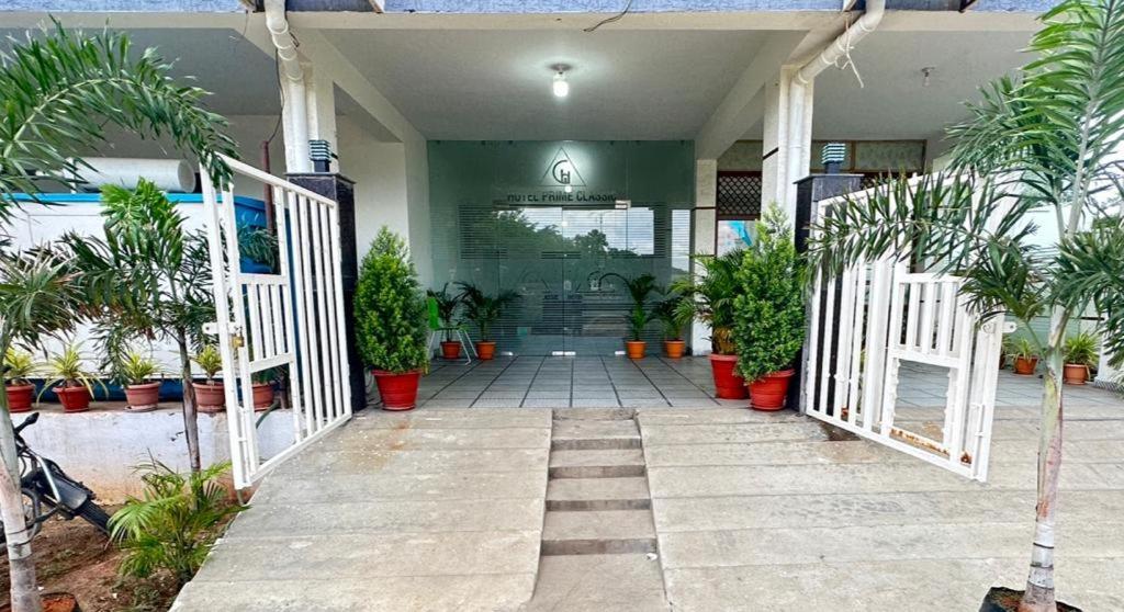 Hotel Prime Classic Shamshabad Bagian luar foto